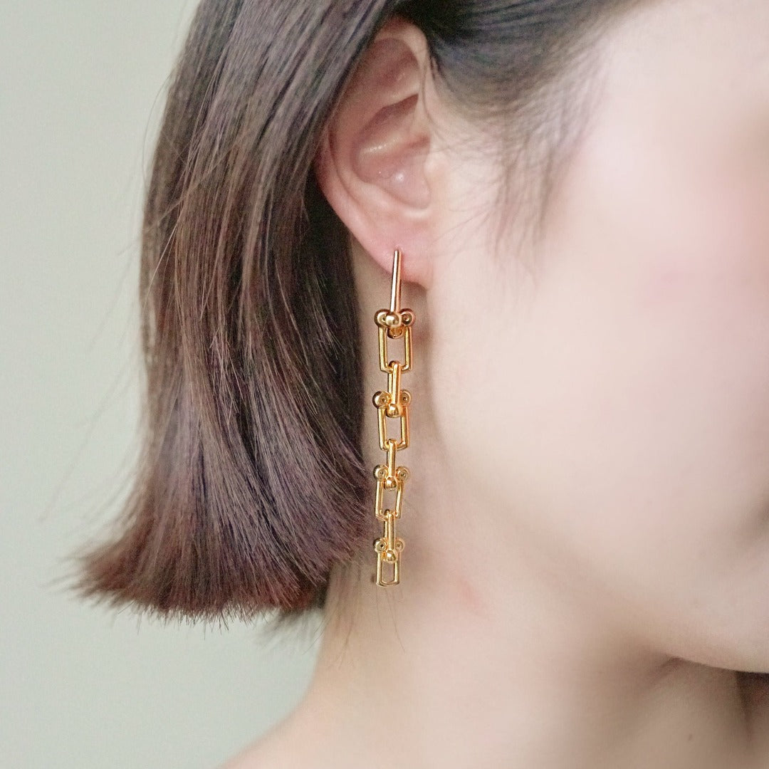 Crush - 18K Yellow Gold plated Knot Long Earrings